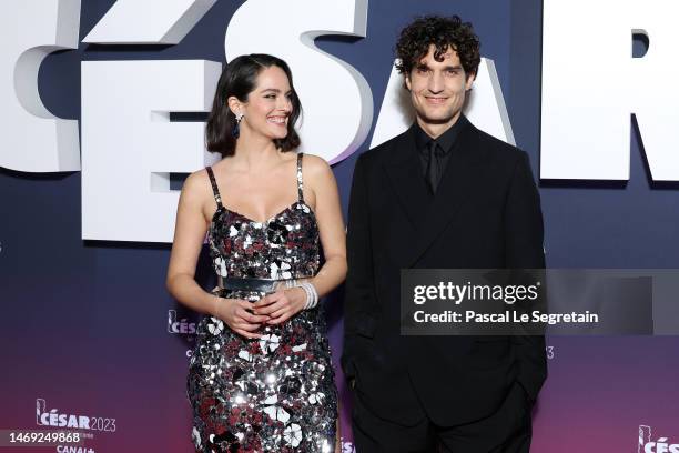 Noémie Merlant and Louis Garrel arrives at the 48th Cesar Film Awards at L'Olympia on February 24, 2023 in Paris, France.