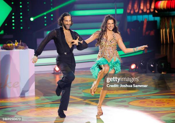 Massimo Sinató and Sally Özcan perform on stage during the first "Let's Dance" show at MMC Studios on February 24, 2023 in Cologne, Germany.