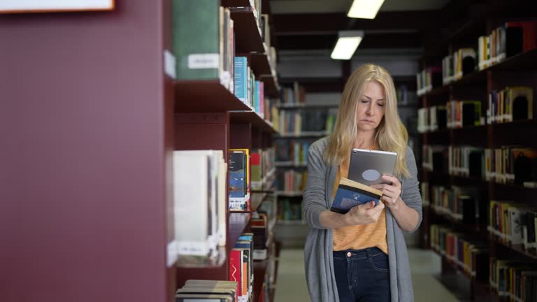Book Library Viode 52 Library Book Scan Stock Videos, Footage, & 4K Video Clips - Getty Images