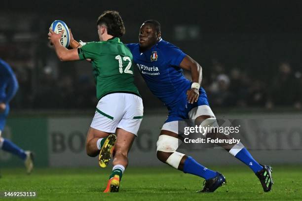 David Odiase of Italy competes for the ball with John Devine of Ireland U20 during the U20 Six Nations Rugby match between Italy and Ireland at...