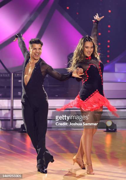Alexandru Ionel and Alex Mariah Peter perform on stage during the first "Let's Dance" show at MMC Studios on February 24, 2023 in Cologne, Germany.