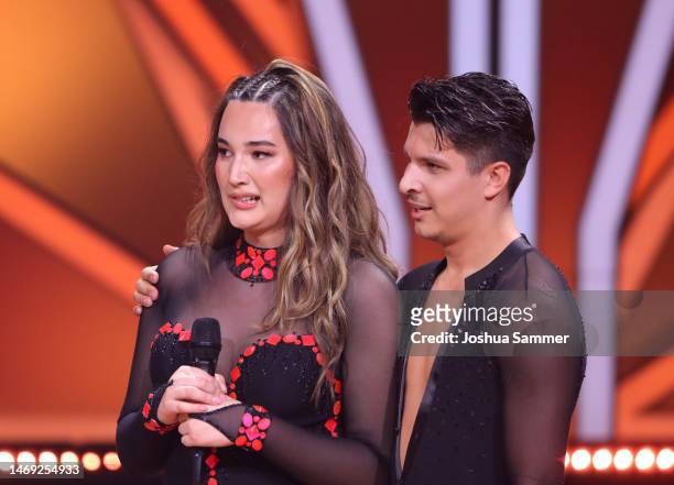 Alexandru Ionel and Alex Mariah Peter on stage during the first "Let's Dance" show at MMC Studios on February 24, 2023 in Cologne, Germany.