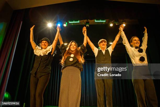 four actors on stage taking the applause - acting performance stock pictures, royalty-free photos & images