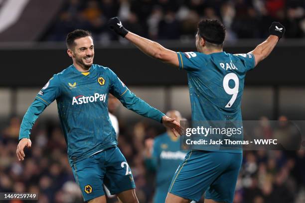 Pablo Sarabia of Wolverhampton Wanderers celebrates with teammate Raul Jimenez after scoring the team's first goal during the Premier League match...