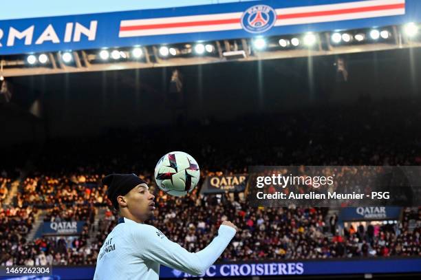 Hugo Ekitike controls the ball during a Paris Saint-Germain training session at Parc des Princes on February 24, 2023 in Paris, France.