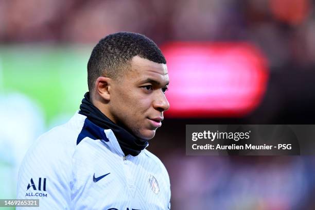 Kylian Mbappe looks on during a Paris Saint-Germain training session at Parc des Princes on February 24, 2023 in Paris, France.