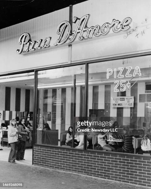 On March 13 pizza cost 25 cents a slice at Pizza D'Amore in the Mid-Island Shopping Plaza in Hicksville, New York.
