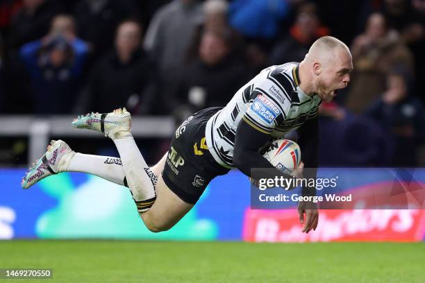 Adam Swift of Hull FC scores the team's third try during the Betfred Super League match between Leeds Rhinos and Hull FC at Headingley on February...