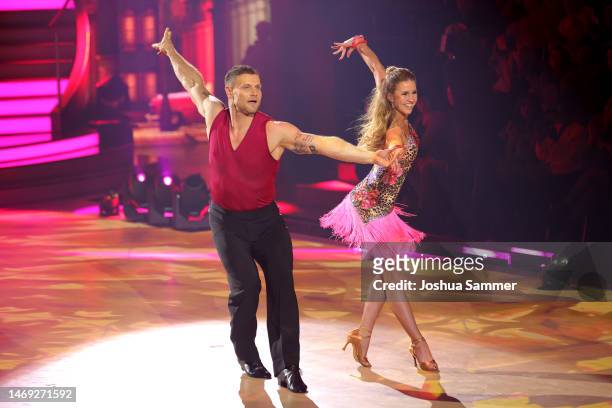 Michael "Mimi" Kraus and Mariia Maksina perform on stage during the first "Let's Dance" show at MMC Studios on February 24, 2023 in Cologne, Germany.