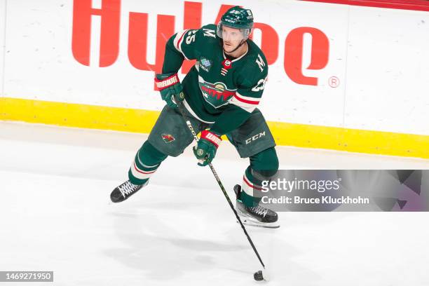 Jonas Brodin of the Minnesota Wild handles the puck against the Los Angeles Kings during the game at the Xcel Energy Center on February 21, 2023 in...