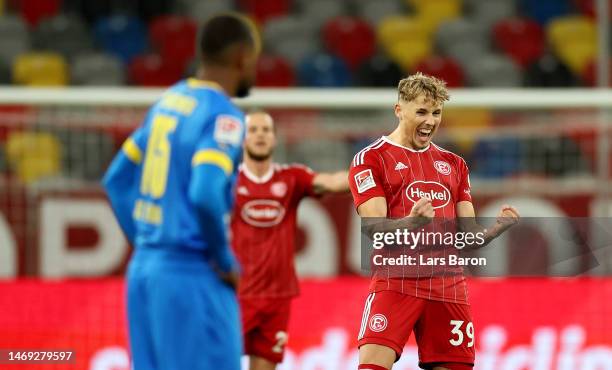 Jona Niemiec of Duesseldorf celebrates after scoring his teams third goal during the Second Bundesliga match between Fortuna Düsseldorf and Eintracht...