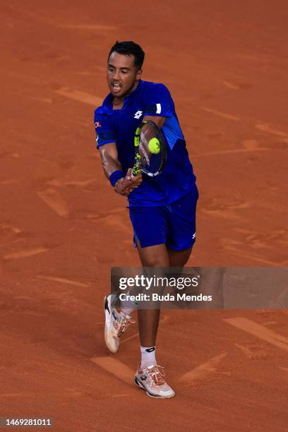 Hugo Dellien of Bolivia returns a shot to Cameron Norrie of Great Britain during day five of ATP 500 Rio Open presented by Claro at Jockey Club...