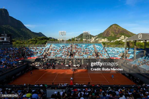 Cameron Norrie of Great Britain returns a shot to Hugo Dellien of Bolivia during day five of ATP 500 Rio Open presented by Claro at Jockey Club...