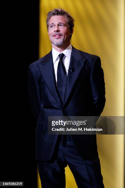Brad Pitt onstage while David Fincher receives the "Honorary César Award" during the 48th Cesar Film Awards at L'Olympia on February 24, 2023 in...