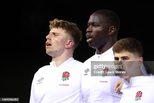 Louie Johnson and Afolabi Fasogbon of England sing the national anthem prior to the U20 Six Nations Rugby match between Wales and England at Stadiwm...