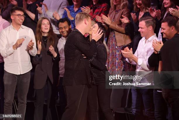 Jens 'Knossi' Knossalla kisses Lia Mitrou during the first "Let's Dance" show at MMC Studios on February 24, 2023 in Cologne, Germany.