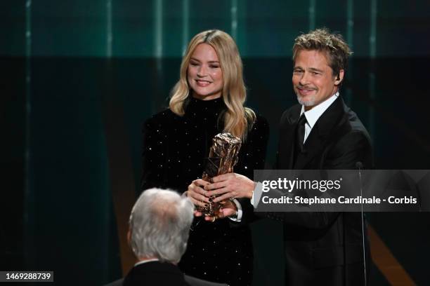 Brad Pitt and Virginie Efira onstage while David Fincher receives the "Honorary César Award" during the 48th Cesar Film Awards at L'Olympia on...