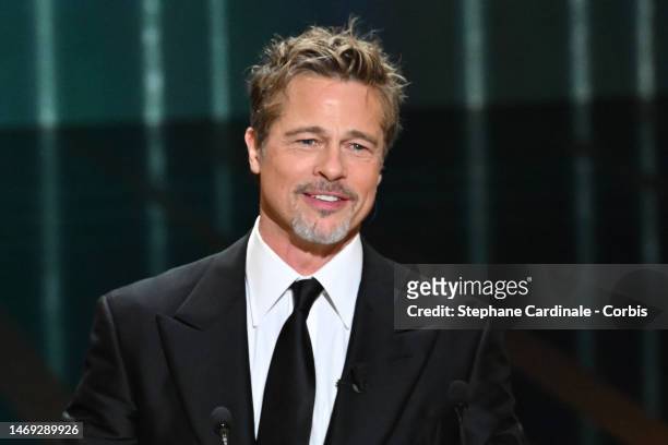 Brad Pitt onstage while David Fincher receives the "Honorary César Award" during the 48th Cesar Film Awards at L'Olympia on February 24, 2023 in...