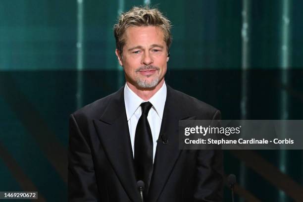 Brad Pitt onstage while David Fincher receives the "Honorary César Award" during the 48th Cesar Film Awards at L'Olympia on February 24, 2023 in...