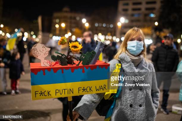 Woman demonstrates in support of Ukraine on the first anniversary of the war on February 24, 2023 in Barcelona, Spain. On February 24, 2022 Russia...