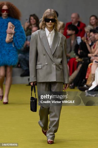 Model walks the runway during the Gucci Ready to Wear Fall/Winter 2023-2024 fashion show as part of the Milan Fashion Week on February 24, 2023 in...