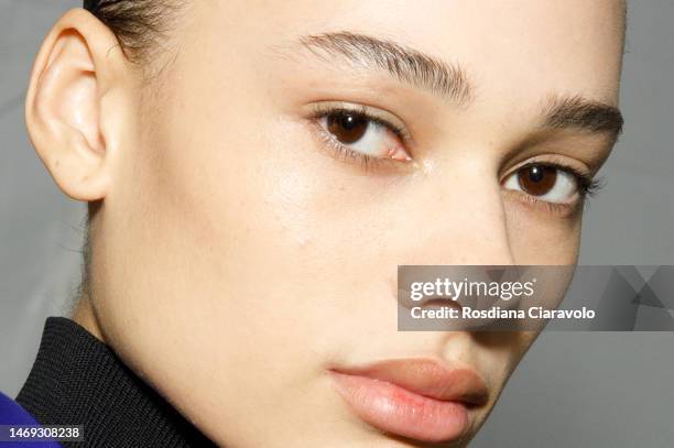 Annemary Aderibigde poses backstage at the Jil Sander fashion show during the Milan Fashion Week Womenswear Fall/Winter 2023/2024 on February 24,...