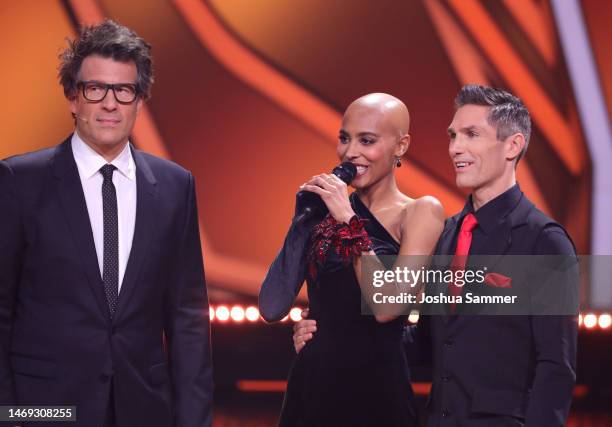 Daniel Hartwich with Christian Polanc and Sharon Battiste on stage during the first "Let's Dance" show at MMC Studios on February 24, 2023 in...