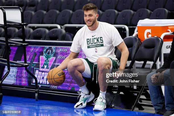 Meyers Leonard of the Milwaukee Bucks, who signed a 10-day contract, warms up before the game against the Miami Heat at Fiserv Forum on February 24,...