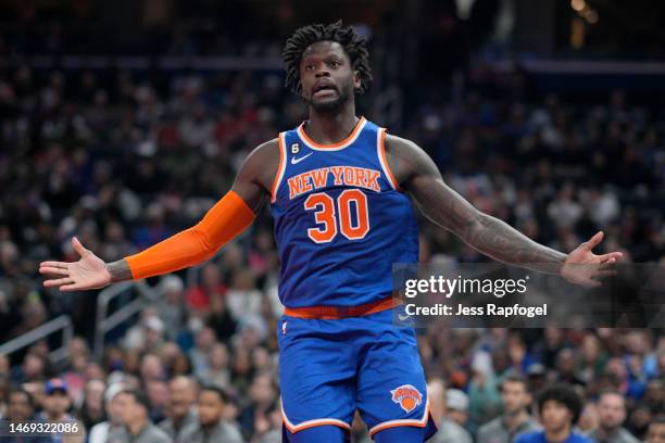 Julius Randle of the New York Knicks reacts after scoring against the Washington Wizards during the first half at Capital One Arena on February 24,...