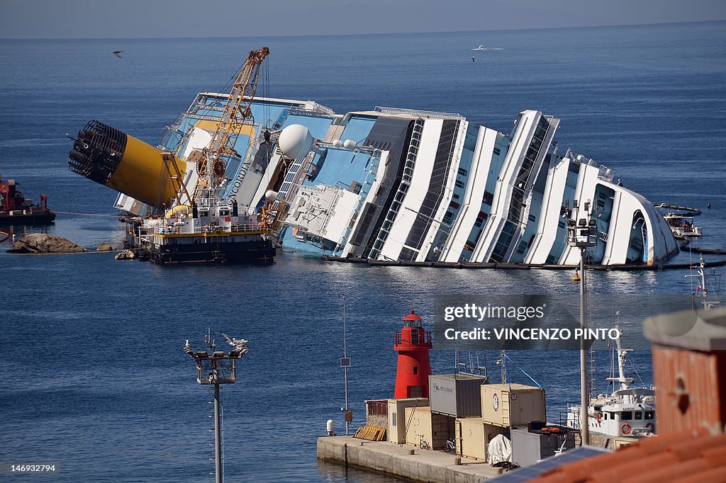Workers of the U.S. firm Titan Salvage a