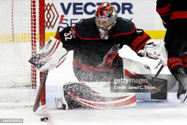 Antti Raanta of the Carolina Hurricanes makes a save during the second period of the game against the Ottawa Senators at PNC Arena on February 24,...