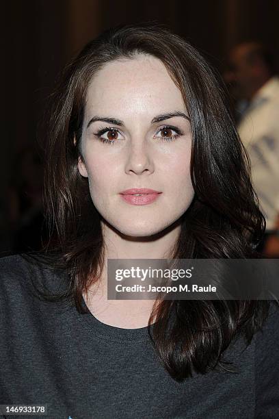 Actress Michelle Dockery attend the Burberry Prorsum show as part of Milan Fashion Week Menswear Spring/Summer 2013 on June 23, 2012 in Milan, Italy.