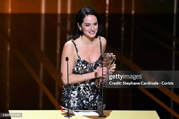 Noemie Merlant poses with the "Best supporting actress" César award for the movie "L'innocent" during the 48th Cesar Film Awards at L'Olympia on...