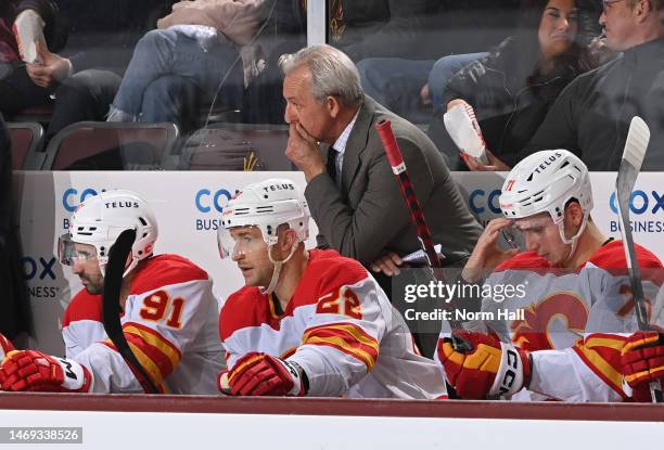 Head coach Darryl Sutter of the Calgary Flames looks on from the bench against the Arizona Coyotes at Mullett Arena on February 22, 2023 in Tempe,...