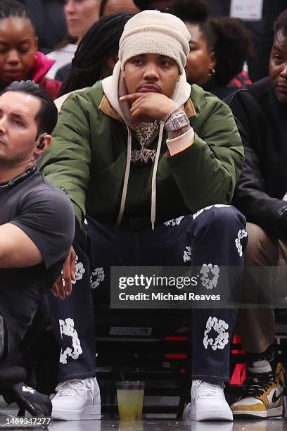 Rapper G Herbo looks on during the second half between the Chicago Bulls and the Brooklyn Nets at United Center on February 24, 2023 in Chicago,...