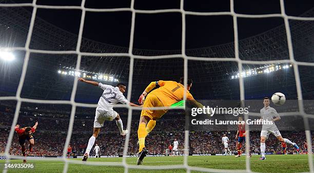 Xabi Alonso of Spain scores the first goal during the UEFA EURO 2012 quarter final match between Spain and France at Donbass Arena on June 23, 2012...