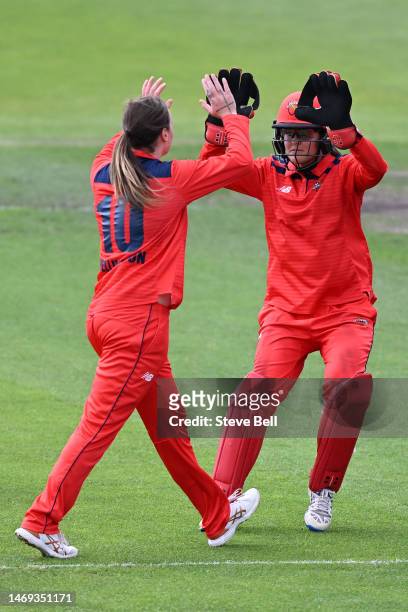 Amanda Jade Wellington and Josie Dooley of the Scorpions celebrates the wicket of Lizelle Lee of the Tigers during the WNCL Final match between...