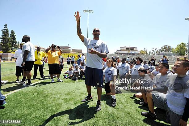 Athlete Bret Lockett rallies the student athletes at the NFL New England Patriot Bret Lockett & Snoop Dogg Football Camp on June 23, 2012 in Diamond...
