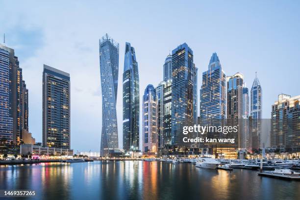 dubai marina district cityscape - middle east flag stock pictures, royalty-free photos & images