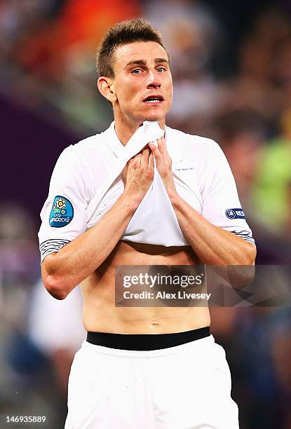Laurent Koscielny of France looks dejected after defeat during the UEFA EURO 2012 quarter final match between Spain and France at Donbass Arena on...