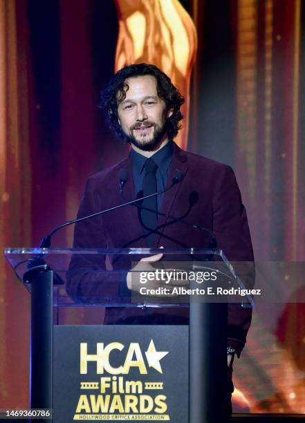 Joseph Gordon-Levitt speaks onstage during the Hollywood Critics Association's 2023 HCA Film Awards at Beverly Wilshire, A Four Seasons Hotel on...