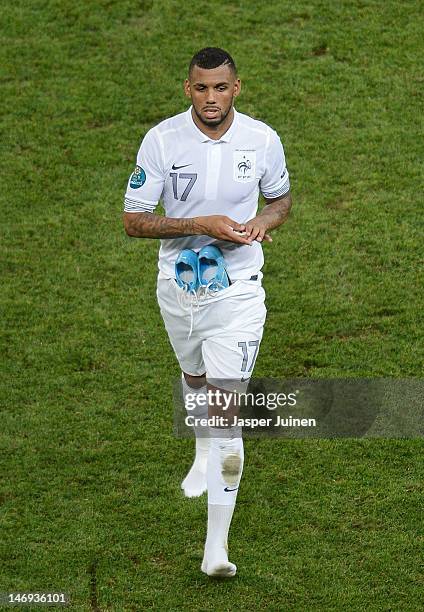 Yann M'Vila of France looks despondent as he is substituted during the UEFA EURO 2012 quarter final match between Spain and France at Donbass Arena...