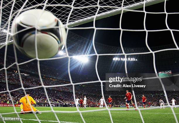 Xabi Alonso of Spain scores the second goal from the penalty spot during the UEFA EURO 2012 quarter final match between Spain and France at Donbass...
