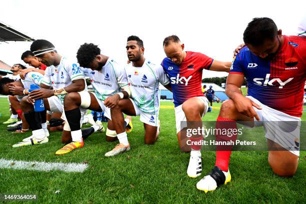 Christian Leali'ifano of Moana Pasifika prays with his team and the Fijian Drua after losing the round one Super Rugby Pacific match between Moana...