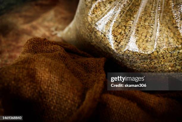 raw green beans coffee waiting for roasting - biomedical animation stock pictures, royalty-free photos & images
