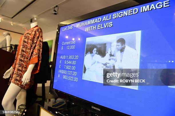Photograph of Elvis Presley and Muhammad Ali and signed by Ali is on display at Julien’s Auctions in Beverly Hills, California on the first day of...