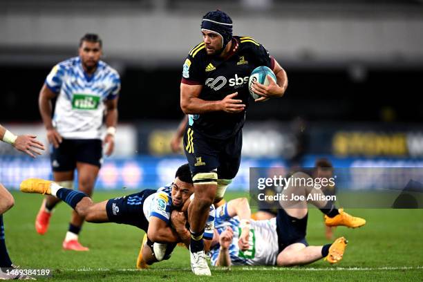 Billy Harmon of the Highlanders charges forward during the round one Super Rugby Pacific match between Highlanders and Blues at Forsyth Barr Stadium,...