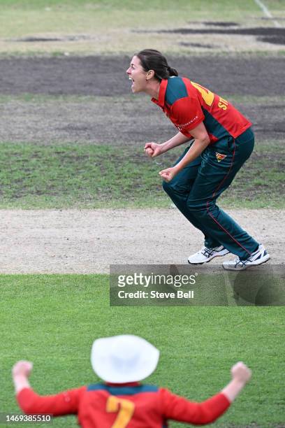 Molly Strano of the Tigers celebrates the wicket of Josie Dooley of the Scorpions during the WNCL Final match between Tasmania and South Australia at...