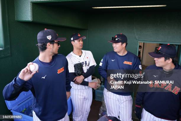 Pitcher Yu Darvish, Pitcher Yuki Udagawa, Infielder Munetaka Murakami and Pitcher Yoshinobu Yamamoto of Samurai Japan talk after the practice game...