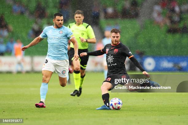 Diego Caballo of Sydney FC competes for the ball against Andrew Nabbout of Melbourne City during the round 18 A-League Men's match between Melbourne...